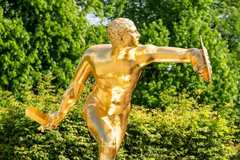 Golden sculpture, warrior with shield and sword, Herrenhausen Gardens, Baroque garden at castle Herrenhausen, HerrenhÃ¤user GÃ¤rten, Hanover, Germany