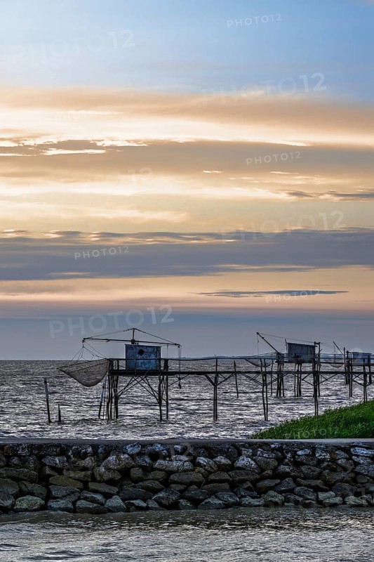 Sunset over Fishing huts over Randonnee entre Histoire et Nature, Fouras, Fouras-les-Bains, Charente-Maritime, Nouvelle-Aquitaine, France