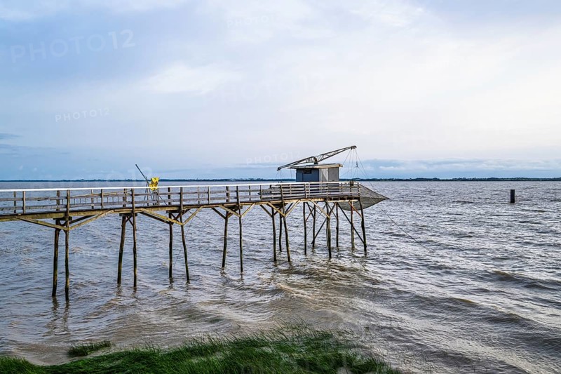 Fishing huts over Gironde Estuary, Braud-et-Saint-Louis, France