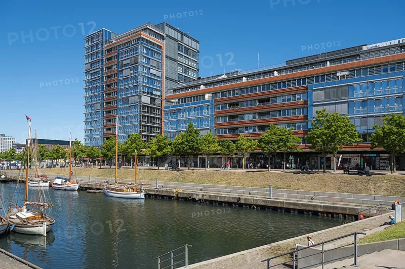 Modern office building and sailing boats at Germaniahafen, museum harbour, Kiel, Kiel Fjord, Baltic Sea, Schleswig-Holstein, Germany