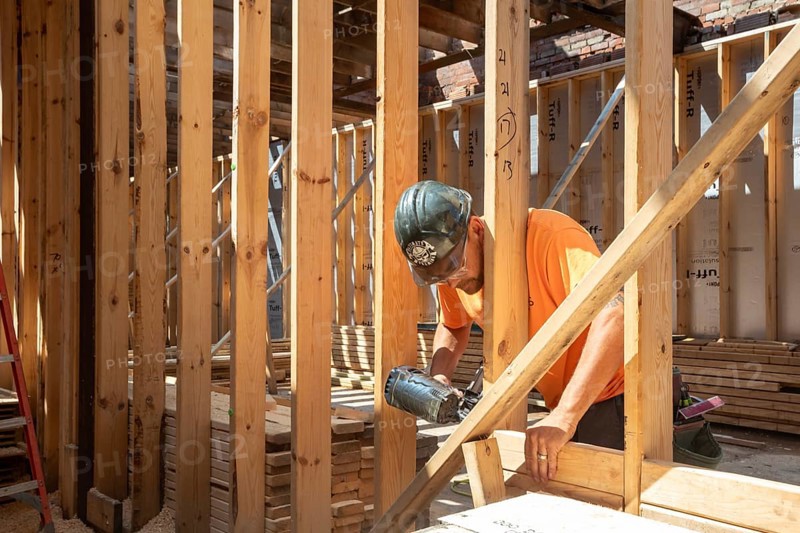 Detroit, Michigan - Jay Newcomb III helps rehab a long-vacant and crumbling commercial building in the Morningside neighborhood. The project, called Ultreia, will contain first floor commercial space and apartments above