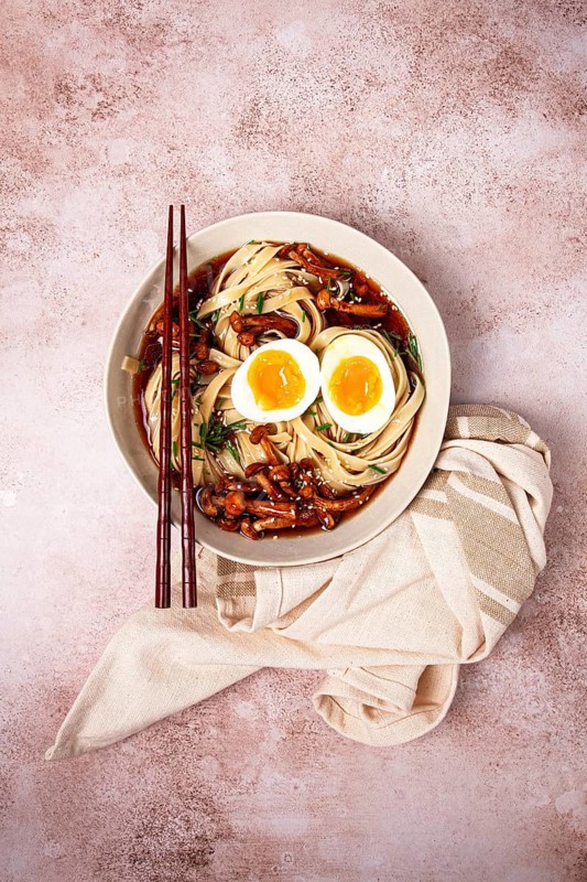 Buckwheat noodles soba with shimeji mushrooms, with boiled egg, green onion, sesame seeds, homemade, without people