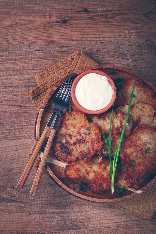 Potato pancakes, pancakes with sour cream, Belarusian dish, homemade, no people