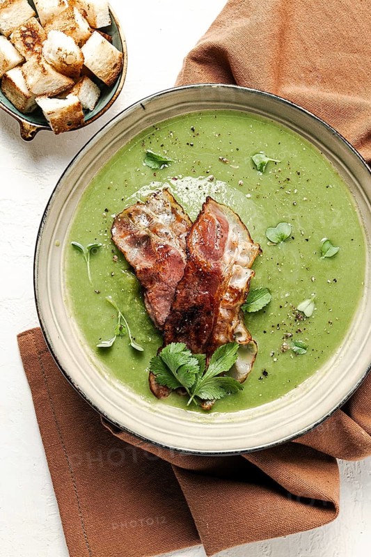 Green mashed soup, with bacon and croutons, homemade, no people