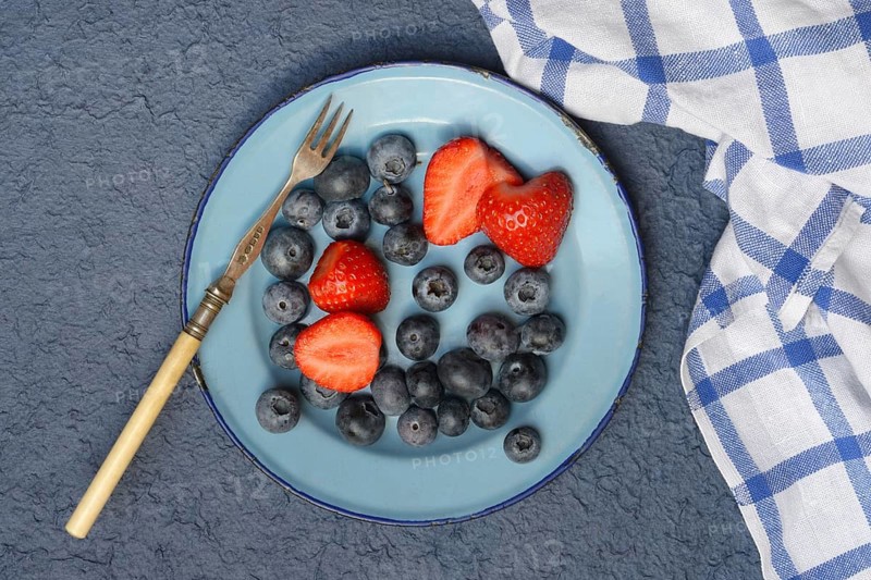 Plate with strawberries and blueberries, Fragaria, Vaccinium