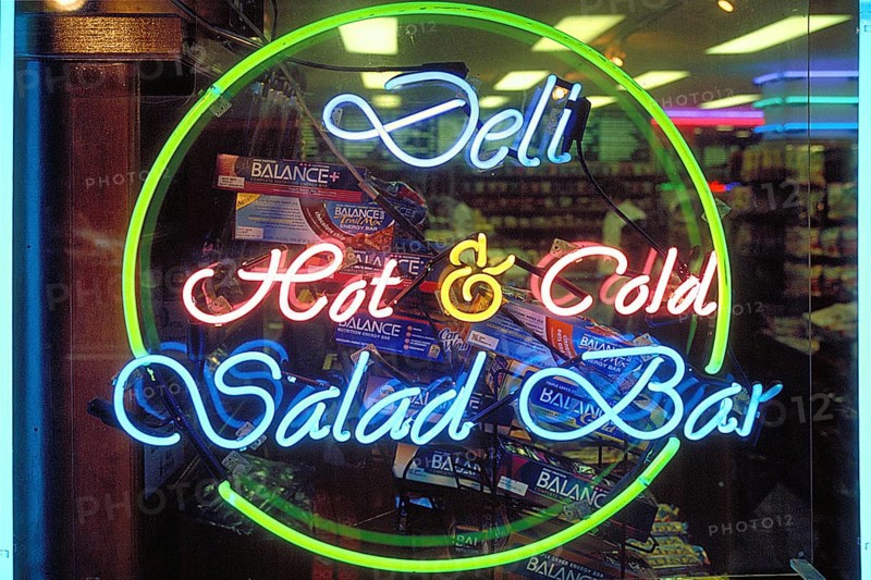 Illuminated advertising at a fast food restaurant, New York City, USA