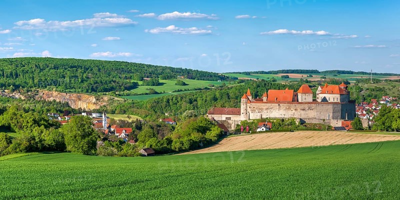 View over a green field to Harburg Castle, Donau-Ries, Swabia, Bavaria, Germany