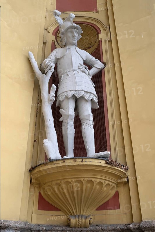 Sculpture of the giant Thyrsus, legendary figure, at the entrance portal of Wilten Abbey, Klostergasse 7, Wilten, Innsbruck, Austria