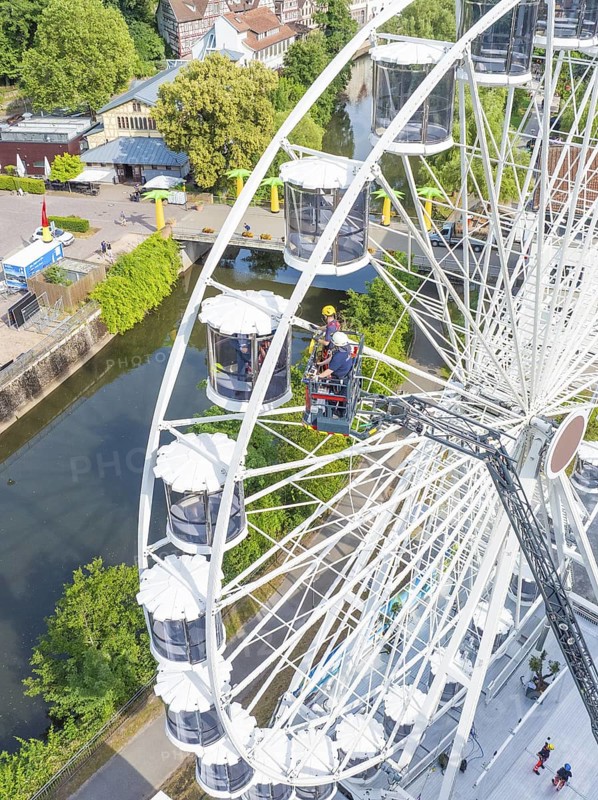 Aerial view of Ferris wheel and emergency services, fire brigade exercise for gondola rescue, Germany