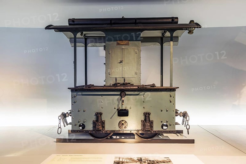 Daimler engine locomotive from 1893. The Mercedes-Benz Museum in Stuttgart presents a journey through the automotive history of the global corporation. The history of the Mercedes star begins with the first automobile in 1886. 160 vehicles are on display. Stuttgart, Baden-WÃ¼rttemberg, Germany