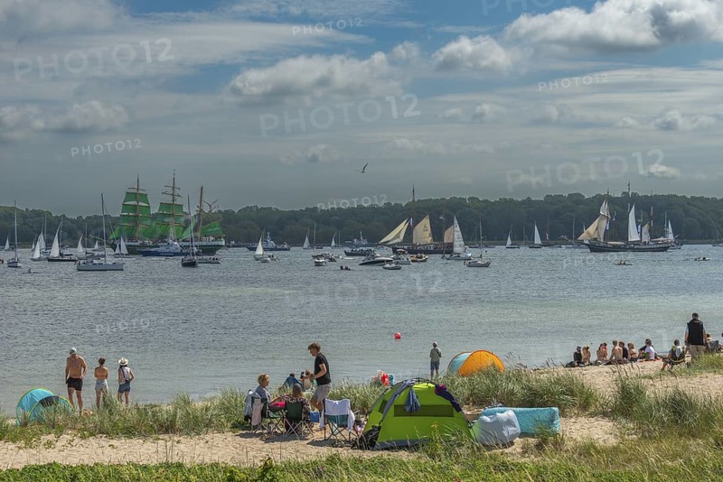 Windjammer Parade 2025 on the Kiel Fjord at the end of Kiel Week, tall ships, three-master Alexander von Humboldt, spectators, Falkensteiner Strandleben, summer weather, sunshine, tent, forest, Kiel, Schleswig-Holstein, Germany