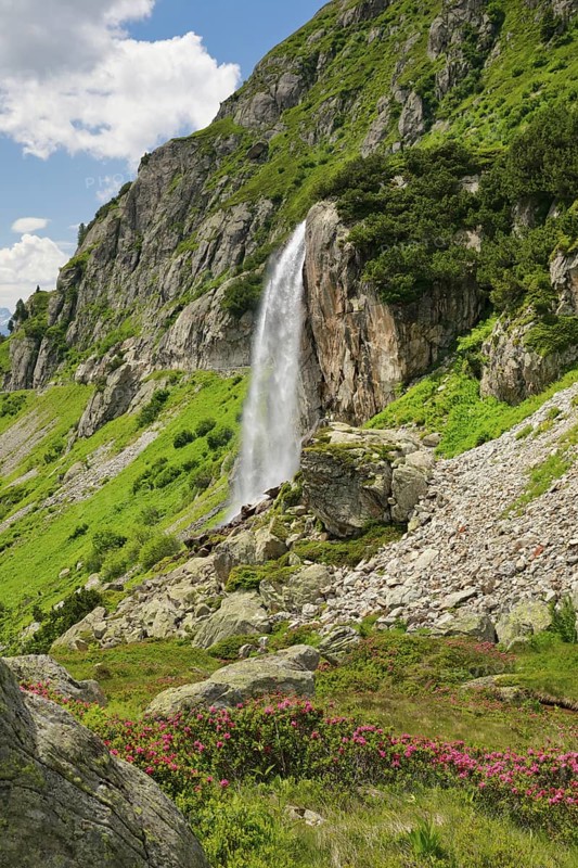 Wyssebach Falls plunges over a striking cliff, Canton of Bern, Switzerland