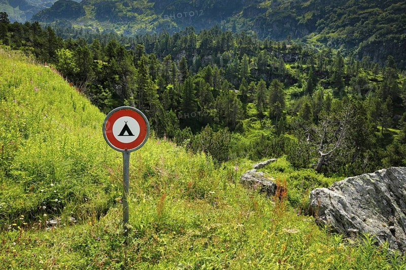 Prohibition sign Camping prohibited in the Alps on the Susten Pass, Switzerland