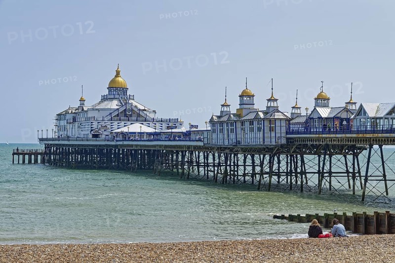 Beach and pier in Eastbourne, seaside resort on the English Channel, in the county of East Sussex, England, United Kingdom of Great Britain