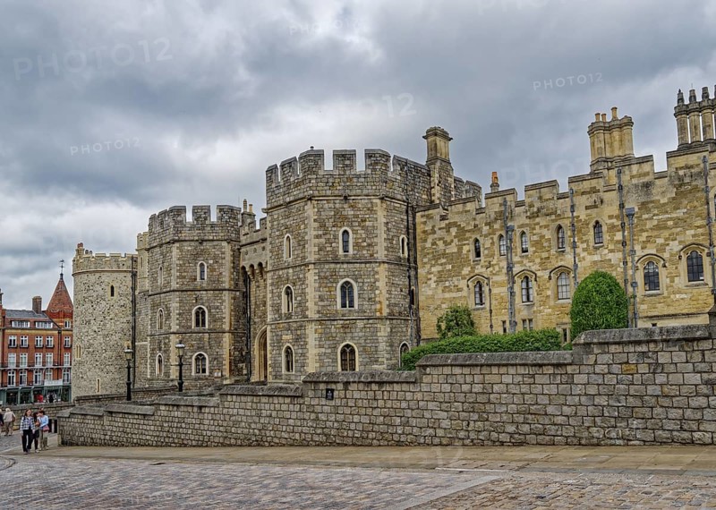 Windsor Castle in front of a cloudy sky. Windsor, Berkshire, England, Great Britain