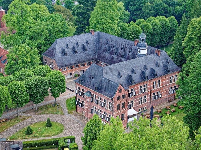 Reinbek Castle, one of the secondary residences of the ducal house of Schleswig-Holstein-Gottorf, was built in the 16th century in the Renaissance style and today serves as the town's art and cultural centre. Aerial view. Reinbek, Schleswig-Holstein, Germany