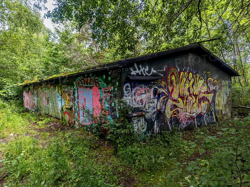 Abandoned military building in the forest, full of graffiti, in Ystad, SkÃ¥ne County, Sweden, Scandinavia