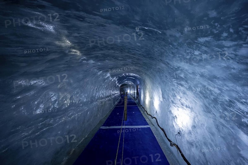 Artificial ice cave through the glacier ice, Mer de Glace, Montenvers, Chamonix, Haute-Savoie, France