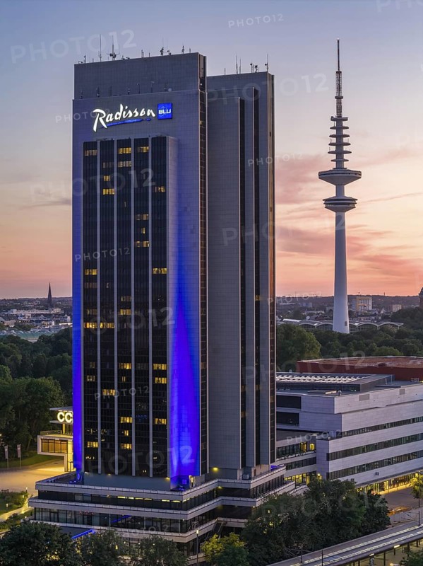 Aerial view of the CCH and Radisson Blue Hotel with television tower Heinrich-Hertz-Turm (Telemichel) at Dammtor at sunset, Hamburg, Germany