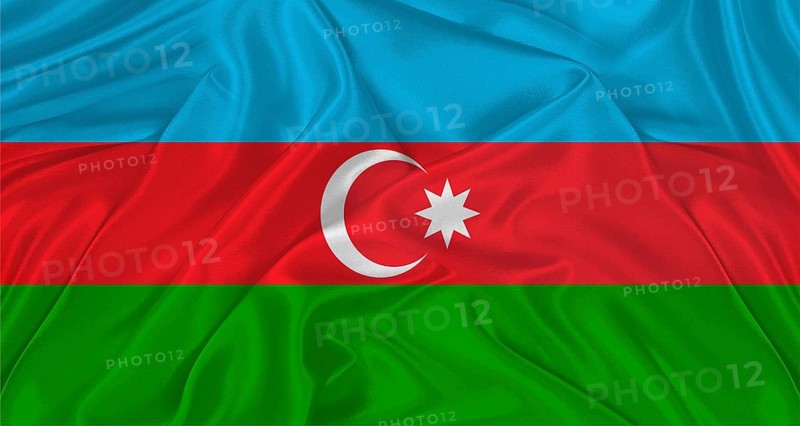Flag of Azerbaijan with cloth texture. Close up of Azerbaijani flag waving