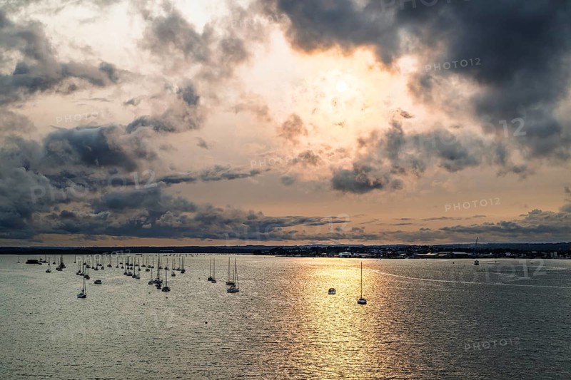 Sunset of Yachts over Ramshorn Lake and Brownsea, Poole, Dorset, England, United Kingdom