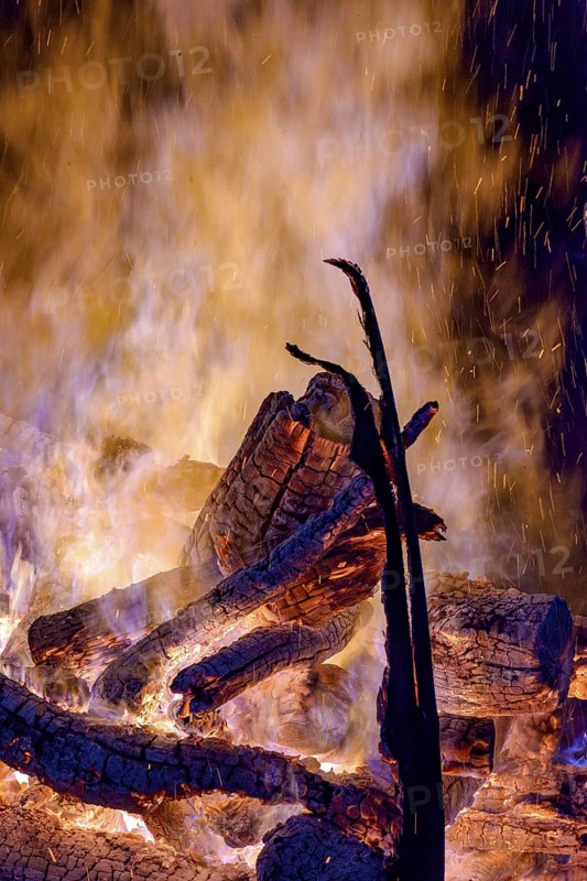 Tree trunks burning in a bonfire in the interior of the state of Minas Gerais during the traditional SÃ£o JoÃ£o festival, Minas Gerais, Brazil