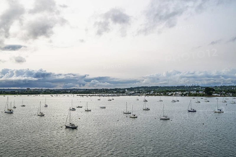 Yachts over Ramshorn Lake and Poole, Brownsea, Dorset, England, United Kingdom