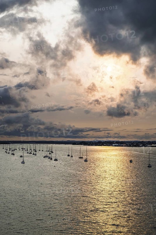 Sunset of Yachts over Ramshorn Lake and Brownsea, Poole, Dorset, England, United Kingdom