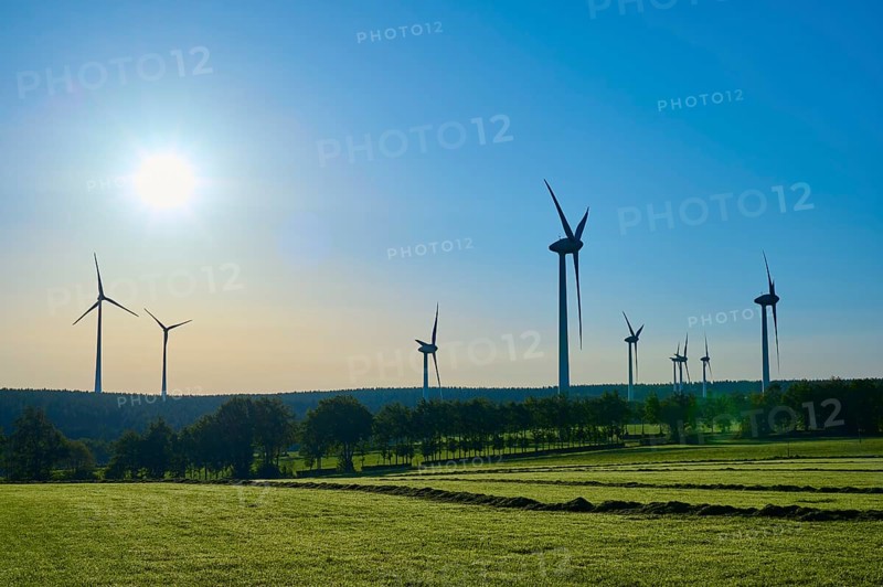 Wind turbines adorn a landscape with sunny skies and green fields, summer, Rohren, Monschau, Eifel, North Rhine-Westphalia, Germany