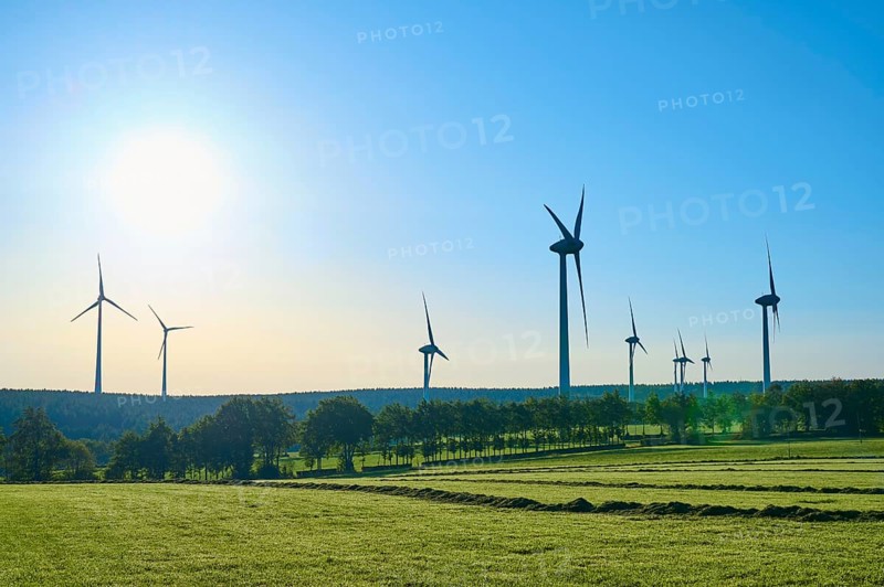 Wind turbines stretch under a sunny sky over a green landscape, summer, Rohren, Monschau, Eifel, North Rhine-Westphalia, Germany