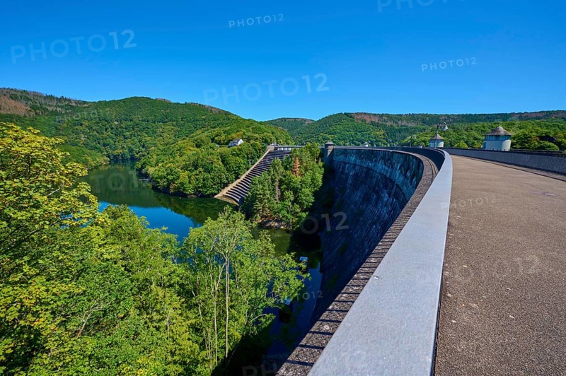 Large dam with water reservoir and lush forest under a clear sky, summer, Urft dam wall, Obersee, Urftsee, Schleiden, Eifel National Park, Eifel, North Rhine-Westphalia, Germany