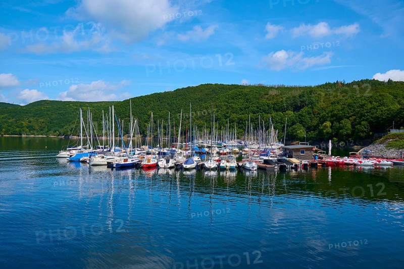 Many boats and sailing boats in the harbour on a sunny day, summer, Rursee, Rurtalsperre, Heimbach, Simmerath, Eifel National Park, North Rhine-Westphalia, Germany
