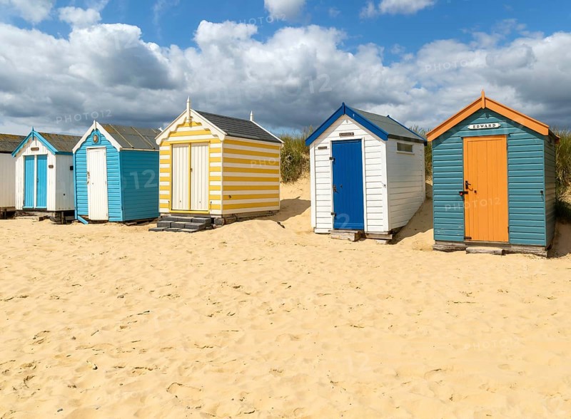Seaside beach huts on the seafront at Southwold, Suffolk, England, UK