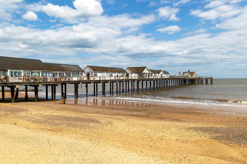 Sandy beach and pier, Southwold, Suffolk, England, UK