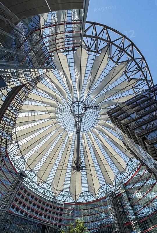 Low-angle view of the glass roof of Das Center at Potsdamer Platz, formerly known as the Sony Center, Berlin, Germany