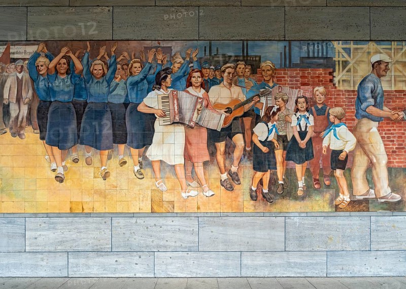 Close-up of the GDR-era Max Lingner propaganda mural, Detlev Rohwedder House, Berlin, Germany