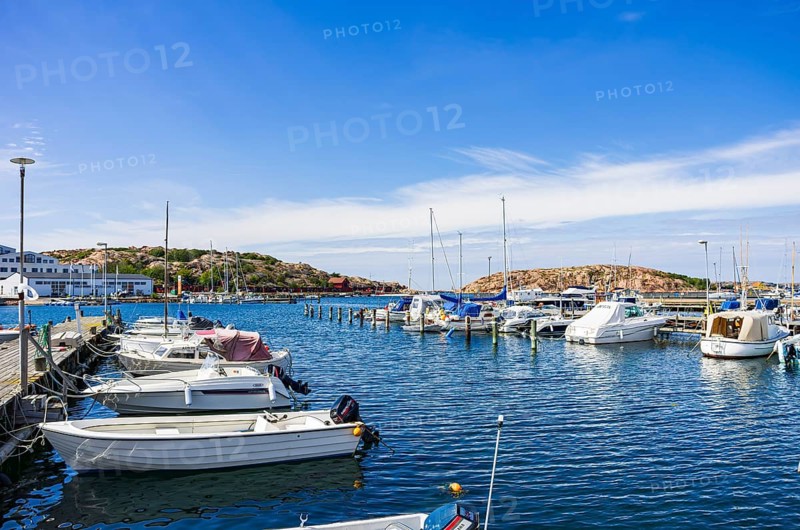 Boats moored at the jetty in the marina in the northern harbour (Norra Hamnen) of Lysekil, BohuslÃ¤n, VÃ¤stra Götalands lÃ¤n, Sweden, Scandinavia, for editorial use only