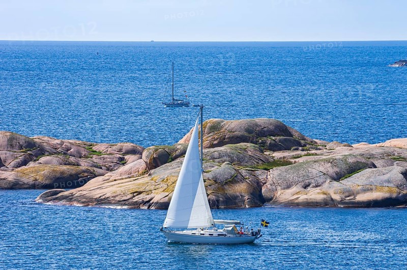 Archipelago with sailing boats off the coast of Lysekil, BohuslÃ¤n, VÃ¤stra Götalands lÃ¤n, Sweden, Scandinavia