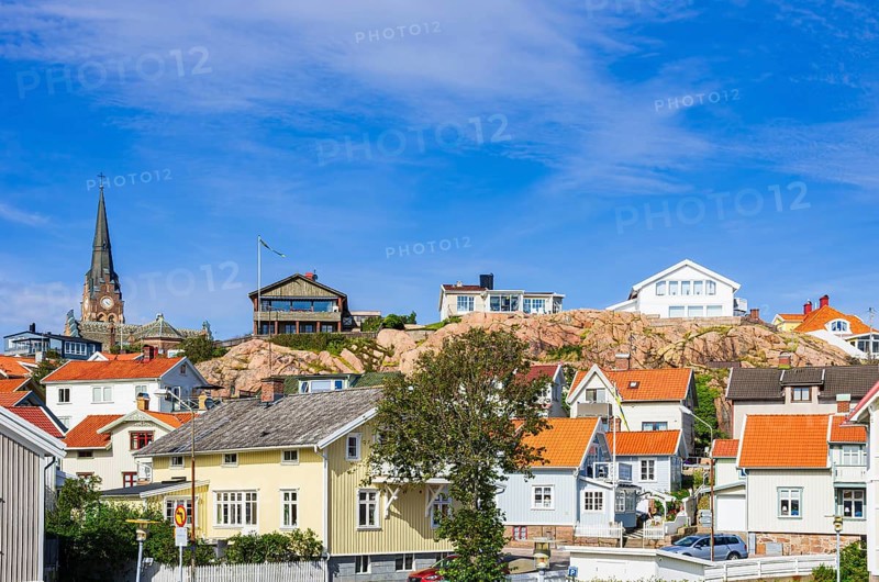 View from the quay in the south to the houses and church of Lysekil, BohuslÃ¤n, VÃ¤stra Götalands lÃ¤n, Sweden, Scandinavia