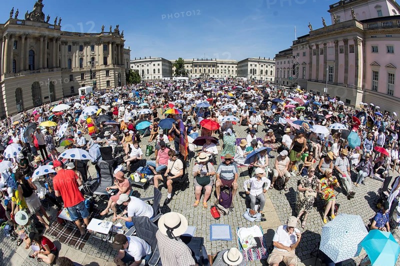 Audience at the Staatsoper fÃ¼r alle, a free open-air concert with conductor Christian Thielemann and the Staatskapelle Berlin on Berlin's Bebelplatz, Berlin, 22 June 2025 Note: the photo was taken with a fisheye lens