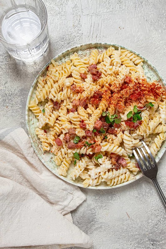 Fusilli pasta with cheese and bacon, homemade, no people