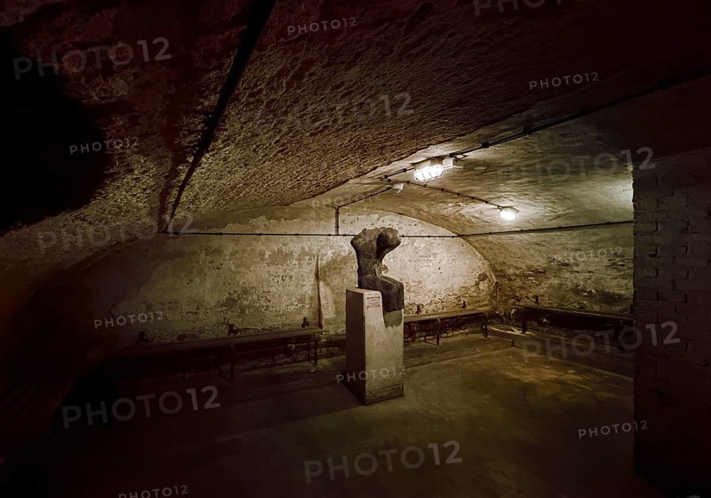 Historic air raid shelter, memorial and memorial with the sculpture Victims by Thomas Duttenhöfer, Düsseldorf, North Rhine-Westphalia, Germany