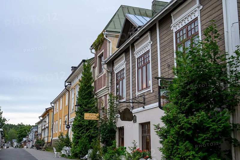 Street scene in the old town of Naantali, quiet street with historic buildings and lots of greenery, a peaceful part of the old town, Naanatali, Varsinais-Suomi, Finland