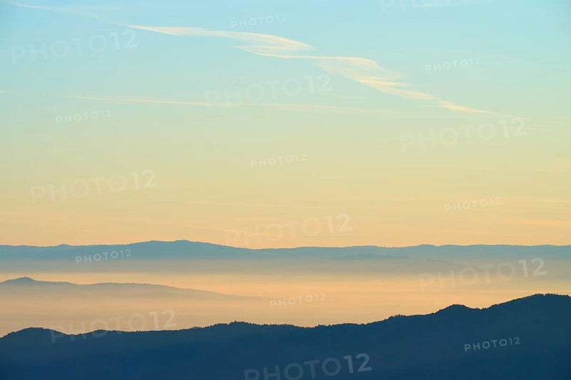 Wide mountain landscape in soft morning light and quiet atmosphere, view of the Rhine Valley, Hohneck, La Bresse, Vosges, France