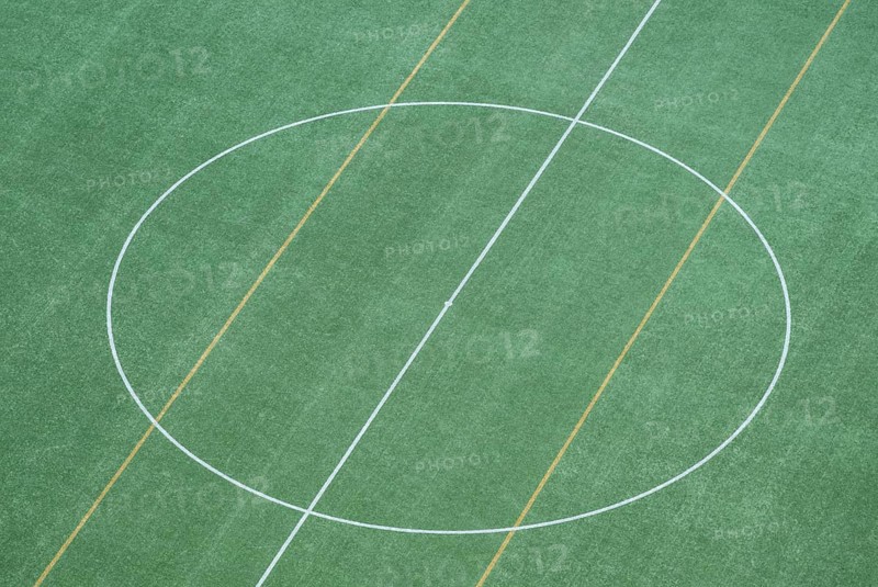 Bird's-eye view of soccer grass field with central circle, view from the tower of the Olympic Stadium in Helsinki, Finland