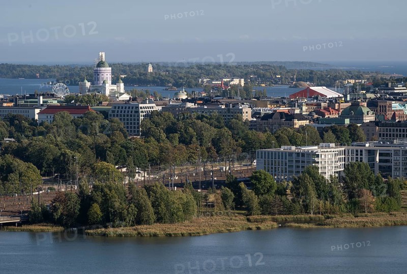View from the Olympic Stadium tower across Lake Töölönlahti to the city center and port of Helsinki, Finland