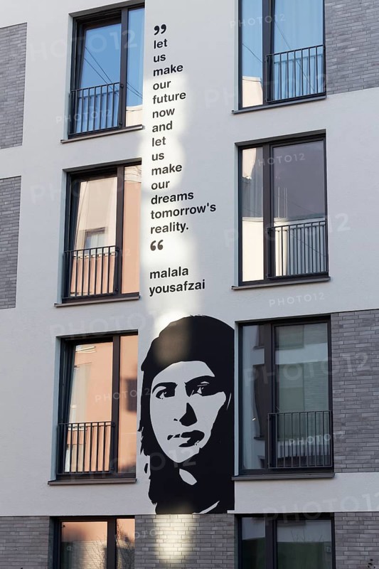 Malala Yousafzai, portrait mural and quote from the Nobel Peace Prize winner at a student residence, Düsseldorf-Derendorf, North Rhine-Westphalia, Germany
