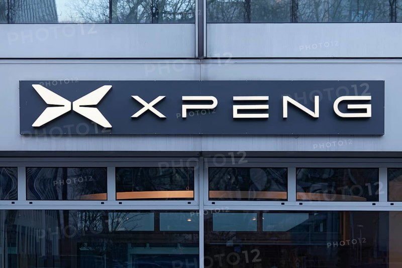 Xpeng, logo at the showroom of Chinese electric car brand Xiaopeng Motors, Düsseldorf, North Rhine-Westphalia, Germany