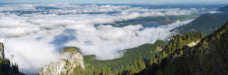 Panorama from Tegelberg, 1881m, of the cloud-covered Forggensee and Bannwaldsee, Ostallgäu, Bavaria, Germany
