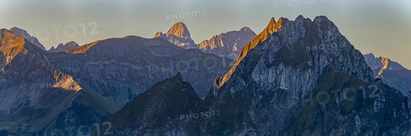 Mountain panorama at sunrise from Nebelhorn, 2224 m, to Höfats 2259 m, behind it the Große Krottenkopf illuminated by the morning sun, 2656m Allgäu Alps, Allgäu, Bavaria, Germany